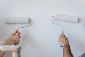 Explore the pros and cons of DIY painting vs. professional painting, including cost, time, quality, and safety.